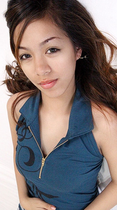 Ciara Navos lays pretty with shirt slightly unzipped