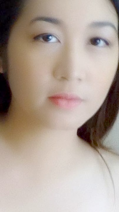 Soft light skin Filipina Chinese mixed cutie Boochi Zamora poses for face shot photo