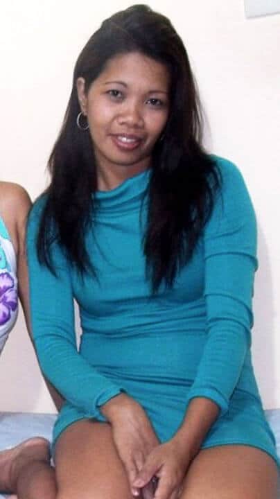 Weng Dela Rosa smiles with aqua dress