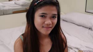 Modeling in bed before getting an asian pussy creampie