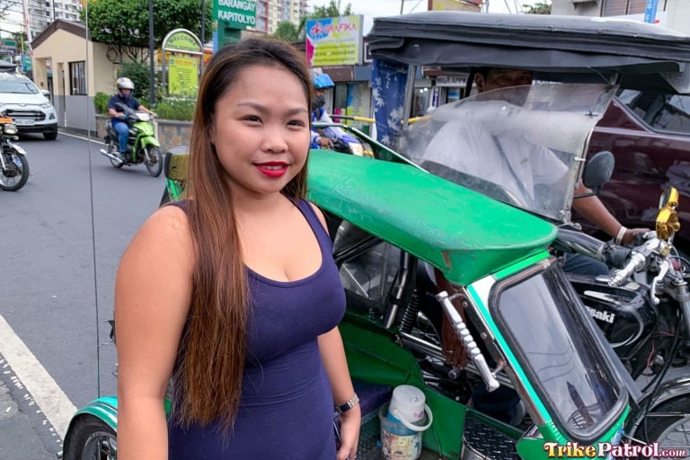 Chubby Asian on the streets of Manila ready to board Trike
