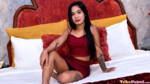 Andrea poses on the bed for her first porn interview
