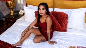 Beautiful Filipina girl Andrea Villanueva models her new dress in bed