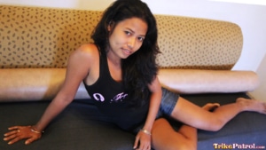 Adorable amateur model strikes sexy pose on the couch