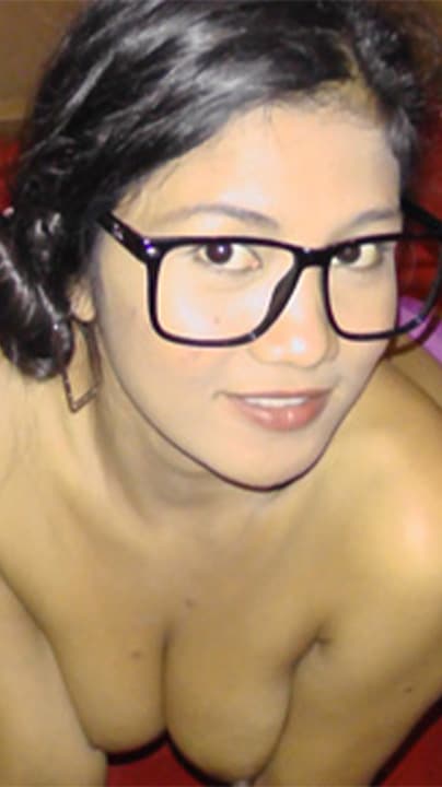 Natasha Tulfo smiles with her tits exposed