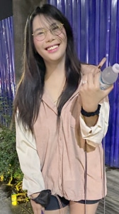 Joyful Filipina babe Kathryn Kaloka smiles and waves at camera