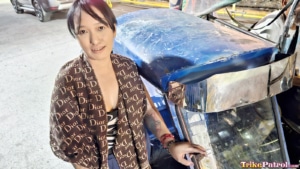 Filipina MILF poses next to trike in Philippine street