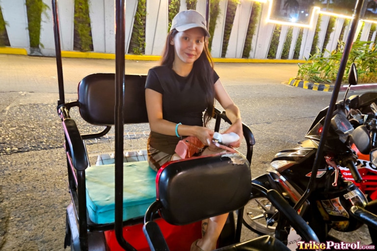 Busty Asian babe poses in trike during trip to Manila