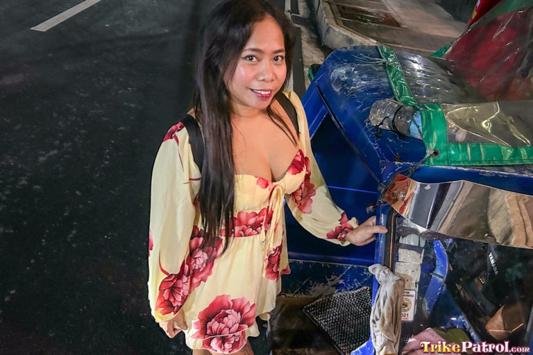 Sexy Thick Filipina Porn model shows cleavage while wearing tight dress