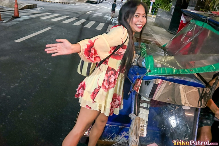 Sexy petite Pinay smiles pretty for the camera while boarding Trike