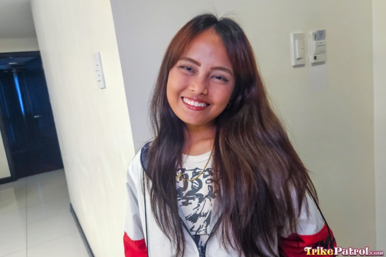 Sexy Filipina smiles pretty for the camera at trikepatrol