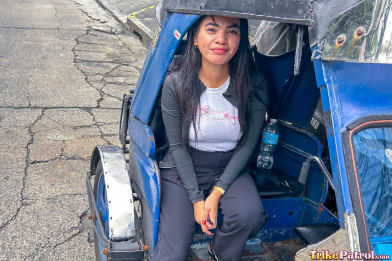 Busty Filipina adult model boards trike in Manila