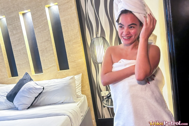 Freshly showered Pinay smiles wearing braces