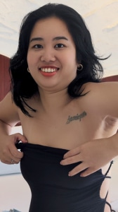 Star Talik begins to undress in the bedroom